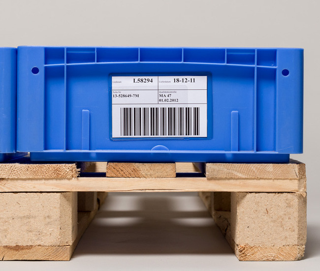 Self-adhesive pockets for plastic boxes