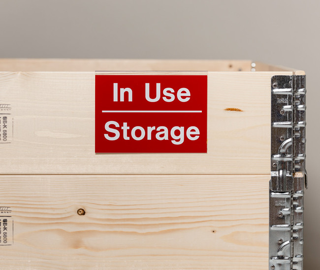 Labelling signs for pallet collars