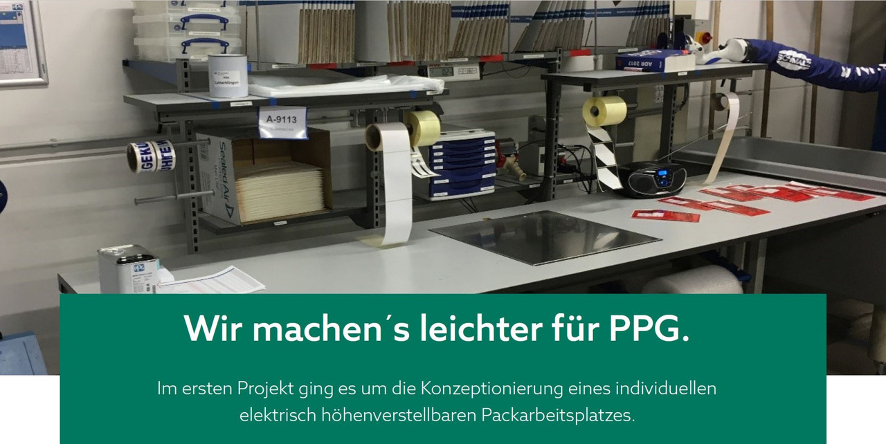 Titelbild: individuell elektrisch höhenverstellbarer Packarbeitsplatz von KROG